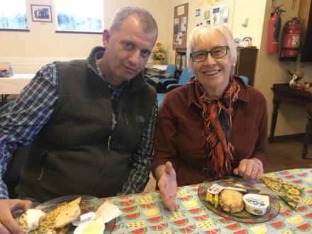 Adrian and trustee Monica enjoy a cream tea